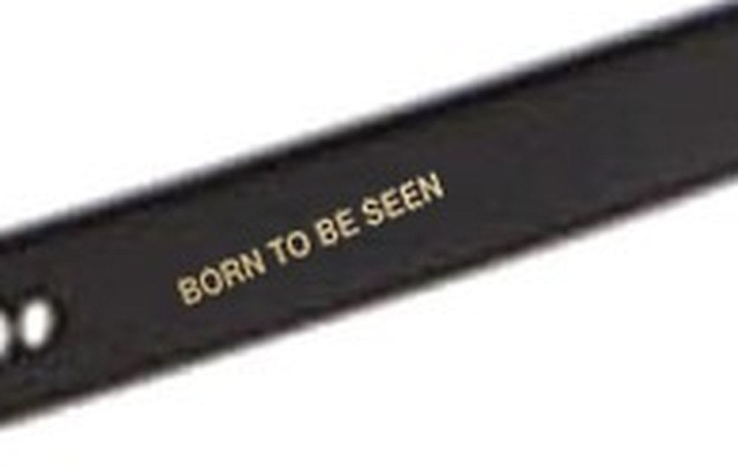 BORN TO BE SEEN gold stamp on a black temple